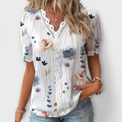 Modieuze blouse met spitse halslijn