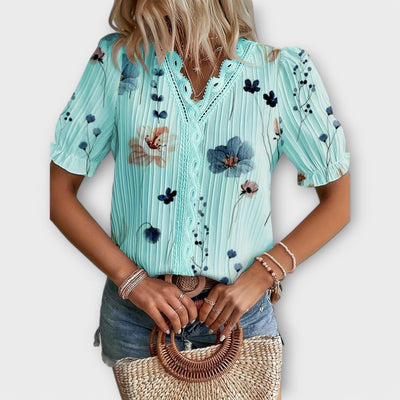 Modieuze blouse met spitse halslijn