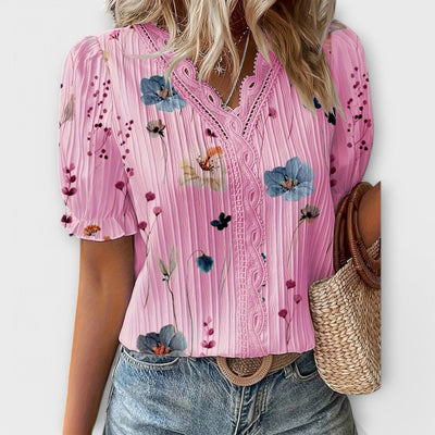 Modieuze blouse met spitse halslijn