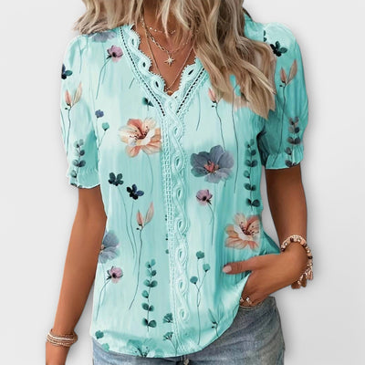 Modieuze blouse met spitse halslijn
