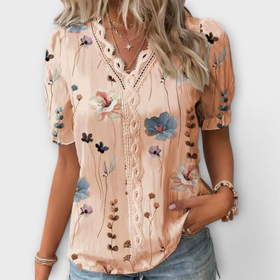 Modieuze blouse met spitse halslijn
