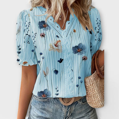 Modieuze blouse met spitse halslijn