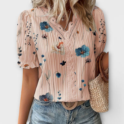 Modieuze blouse met spitse halslijn