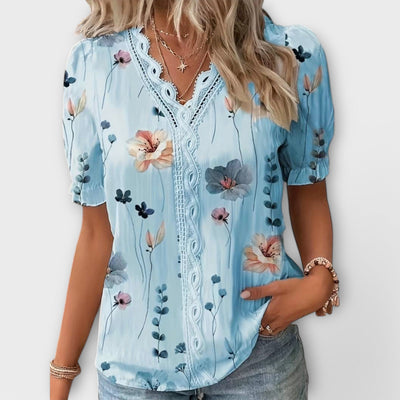 Modieuze blouse met spitse halslijn