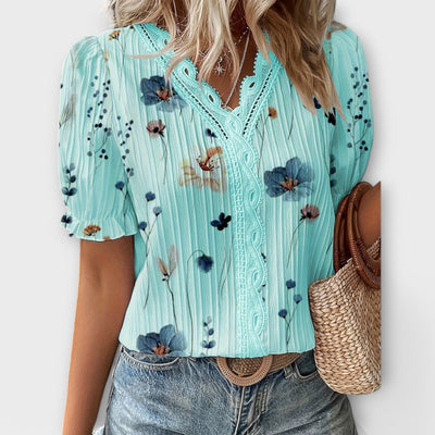 Modieuze blouse met spitse halslijn