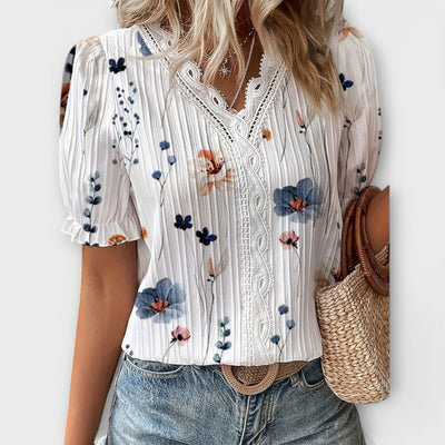 Modieuze blouse met spitse halslijn